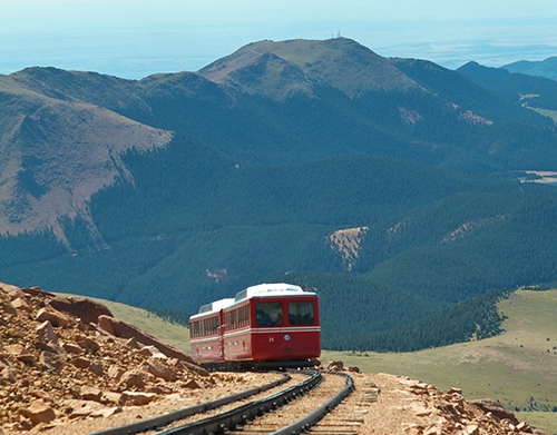The Cog Railway train coming around a corner on Pikes Peak Mountain